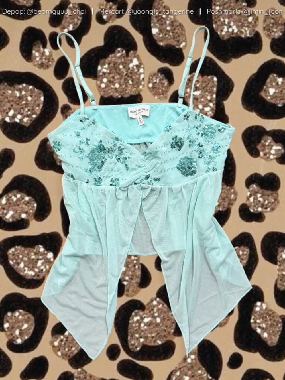Blue-green mesh top with sequin details